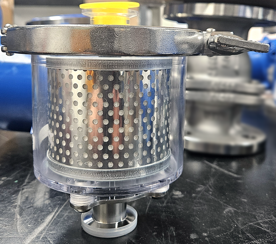 Side view of the VOMT-250 oil mist trap showing the filter inside the transparent case and the clamp at the top
